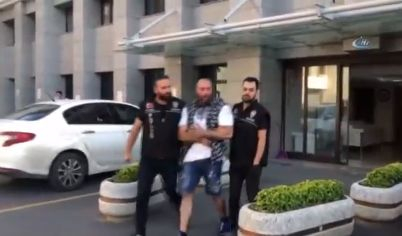 Извънредно от Турция! Появиха се СНИМКИ и ВИДЕО на Митьо Очите, окован в белезници