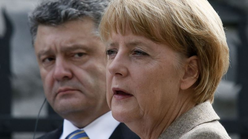 Остри критики срещу Маркел заради срещата ѝ с Порошенко