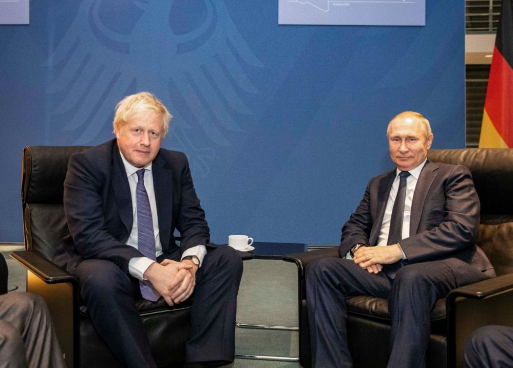 Путин - най-търсеният лидер на срещата в Берлин СНИМКИ