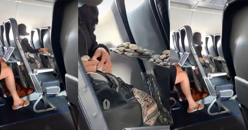 Пътничка в самолет извърши много странни действия ВИДЕО
