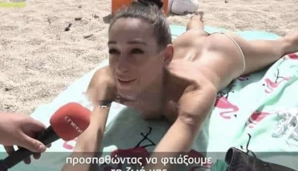 Скандал в Гърция: Разкрачена гола украинска бежанка на плажа се ожали от войната ВИДЕО 18+