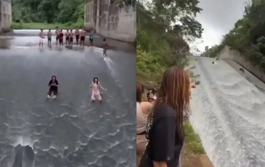 Вижте как жители използват преливника на язовир като водна пързалка Видео